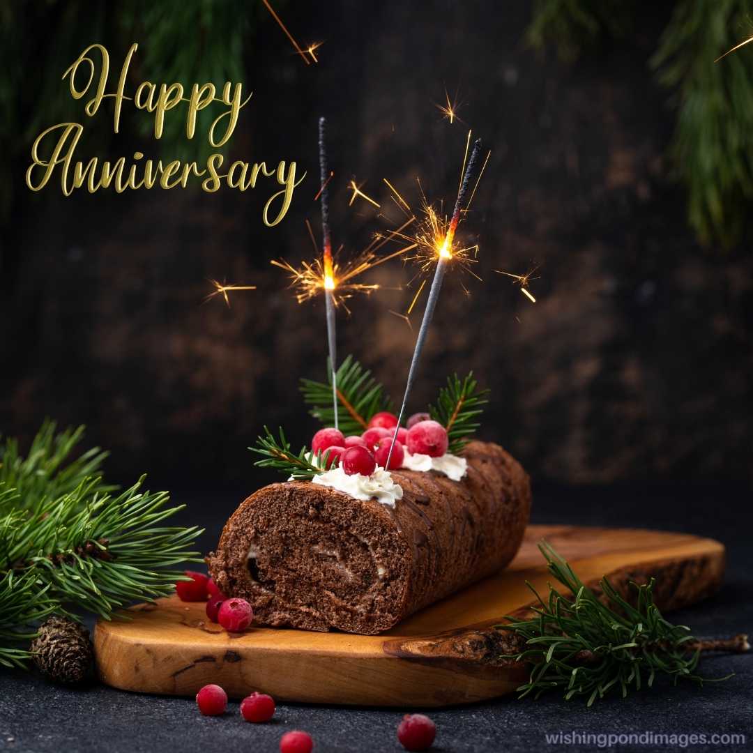 Christmas festive chocolate roll cake with sparkler